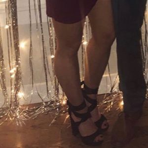 Black platform heels with ankle ties